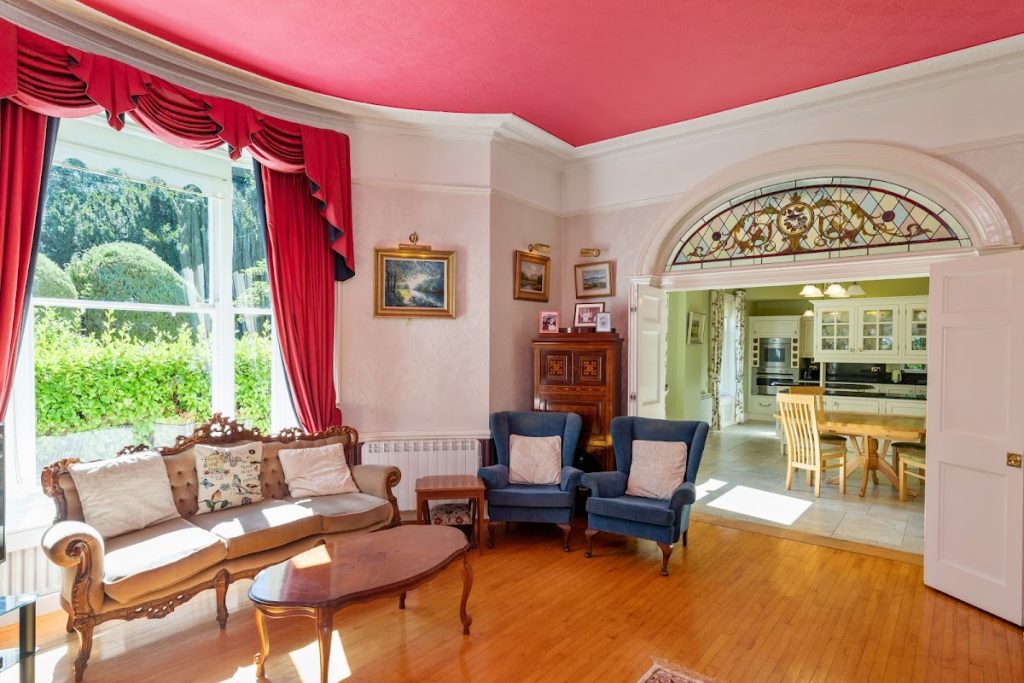 South Hill House, Merrion Park, Booterstown, Blackrock, Co. Dublin - large living room with wood floors and pink ceiling