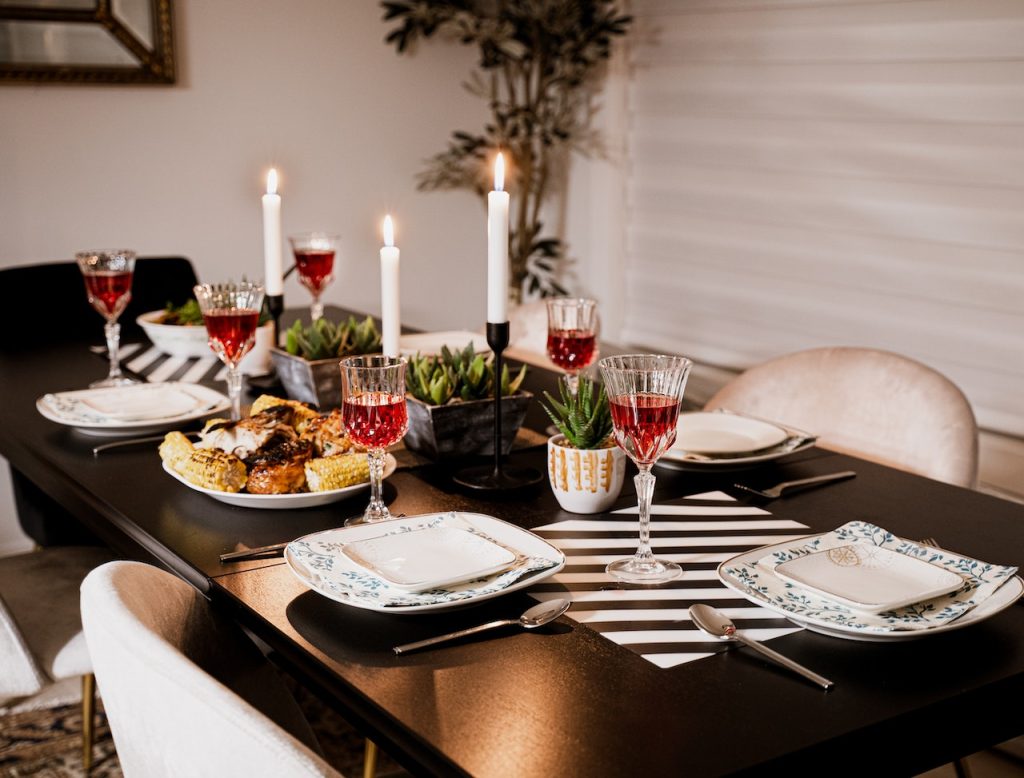 Set table with dinner plates and side plates